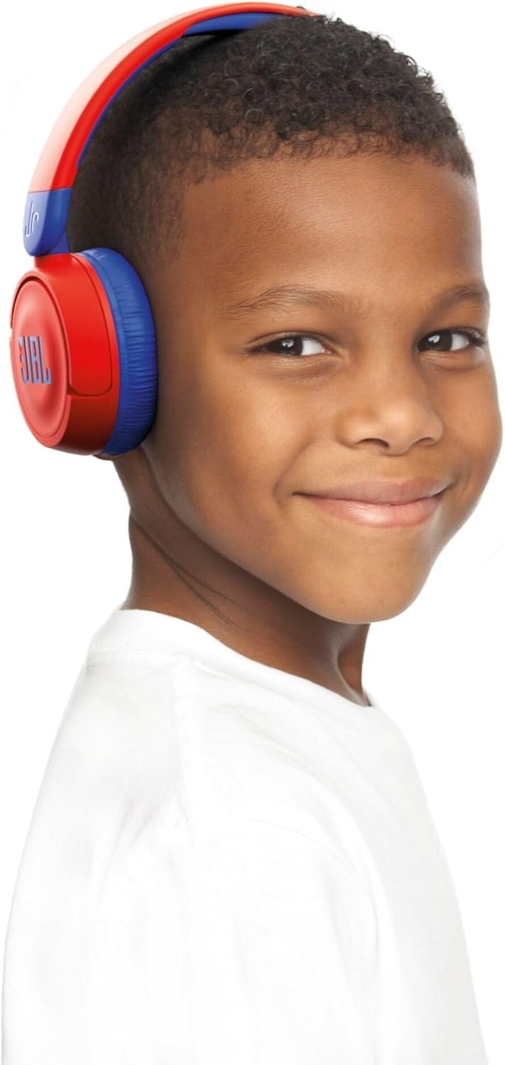 JBL Jr310BT kids headphones Kenya — worn by smiling young boy, red and blue on-ear fit lifestyle shot
