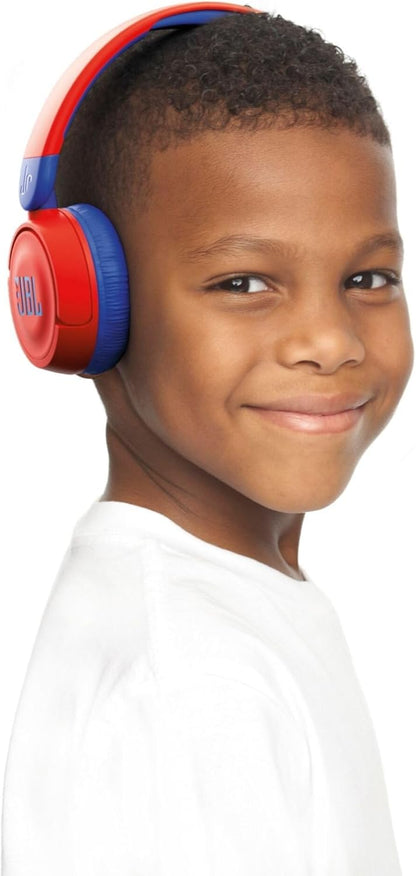 JBL Jr310BT kids headphones Kenya — worn by smiling young boy, red and blue on-ear fit lifestyle shot