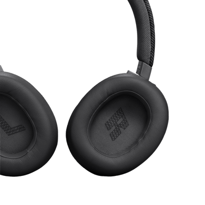 JBL Live 770NC Kenya close-up of cushioned earcups showing soft padding and embossed Bluetooth icon