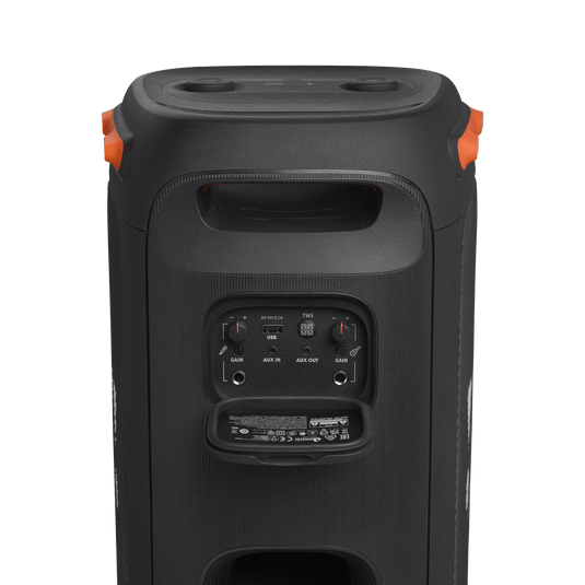 JBL PartyBox 110 Kenya — rear panel open showing guitar, mic, aux and USB input ports, orange carry handles