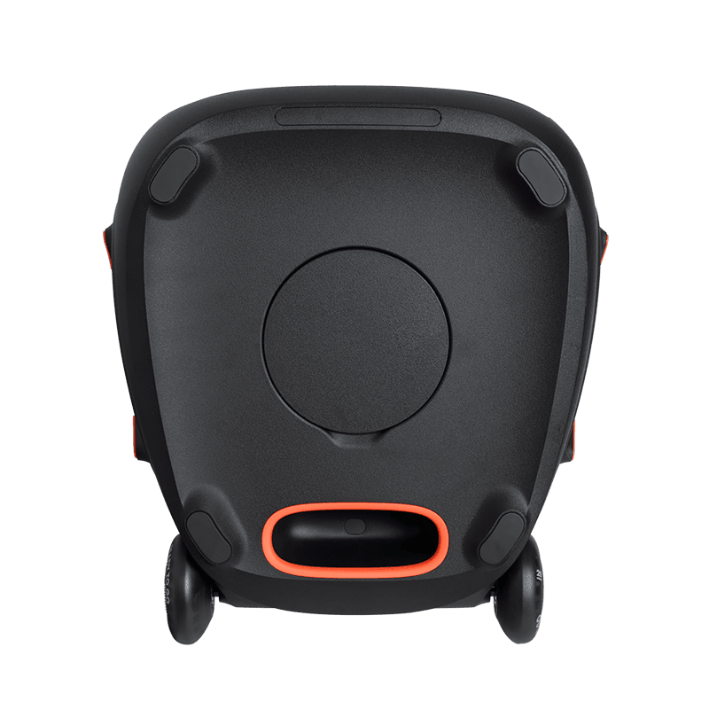 JBL PartyBox 310 Kenya bottom view showing rubber feet, orange bass port opening and dual transport wheels