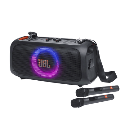 JBL PartyBox On-The-Go Essential Kenya 3/4 front view with active ring light show and two wireless microphones laid in front