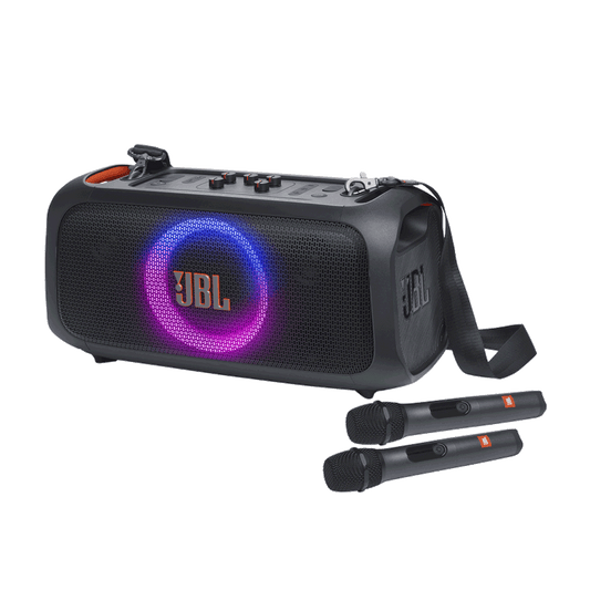 JBL PartyBox On-The-Go Essential Kenya 3/4 front view with active ring light show and two wireless microphones laid in front