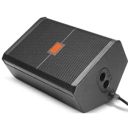 JBL SRX712M stage monitor Kenya in wedge position showing Speakon connector port and connected cable, side-rear angle view