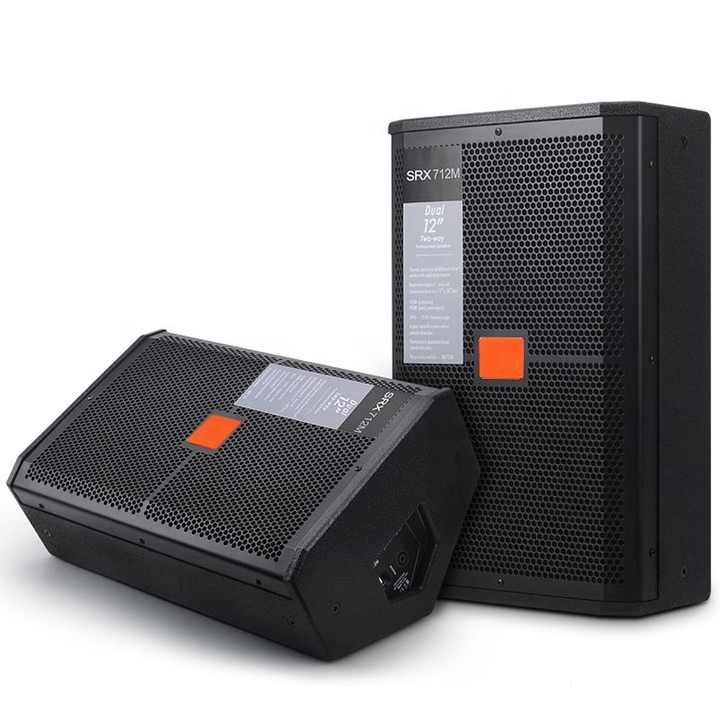JBL SRX712M stage monitor Kenya shown in wedge floor position and upright PA orientation, black enclosure with orange badge