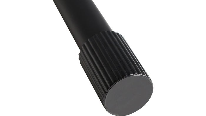 keyboard bench Kenya detail shot of ribbed black rubber non-slip foot cap on steel leg base