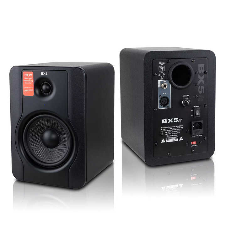 M - Audio BX5 studio monitors Kenya — front and rear pair on reflective surface showing cabinet depth and connectivity