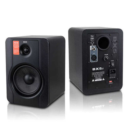 M - Audio BX5 studio monitors Kenya — front and rear pair on reflective surface showing cabinet depth and connectivity