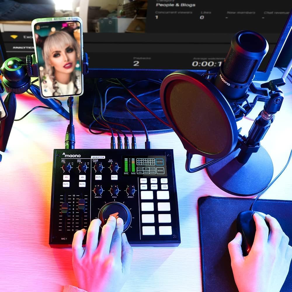 MaonoCaster AM100 Kenya all-in-one podcast production studio front panel with channel faders, LED indicators and jingle pads