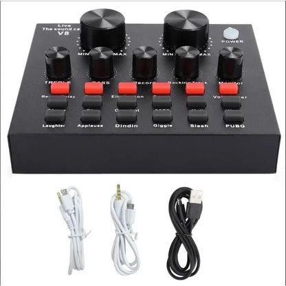 V8 Sound Card Kenya top-down view with included micro-USB, 3.5mm, and USB-A cables laid below unit