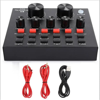 V8 Sound Card Kenya top-angle view with two red 3.5mm audio cables and black USB cable accessory set