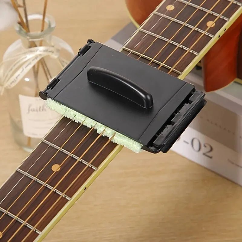 Miwayer guitar string cleaner wrapping around guitar strings to remove sweat and grime