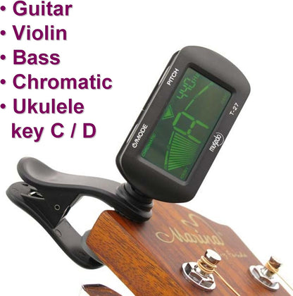 Musedo T-27 clip tuner Kenya clipped onto guitar headstock, LCD display active