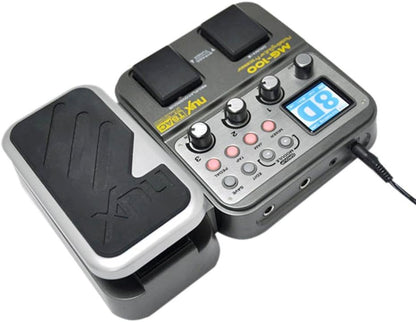 NUX MG-100 guitar processor Kenya — left-angle view with cable connected, showing full control layout and pedal