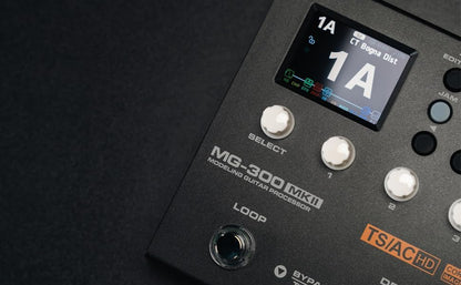 NUX NUX MG-300 Kenya MKII close-up of display showing patch 1A CT Bogna Dist, SELECT knob and TS/AC HD logo