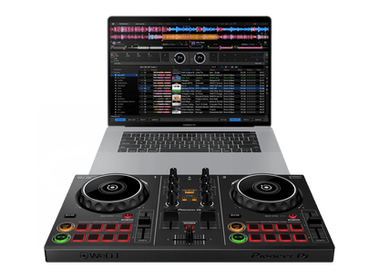 Pioneer DDJ-200 DJ controller Kenya — lifestyle setup with MacBook Pro running rekordbox software in background