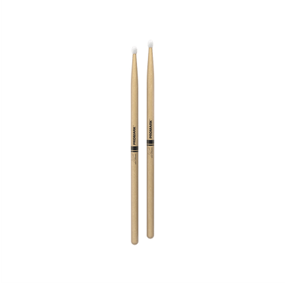 ProMark 2BX drumsticks Kenya — full-length pair standing upright, nylon tips visible, Promark branding