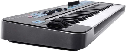 Graphite 49 Kenya angled left-side view showing pitch bend and modulation wheels, blue buttons, and semi-weighted keys