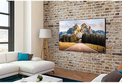 Samsung 55DU7010 Kenya wall-mounted in modern living room with brick wall, sofa, and landscape display