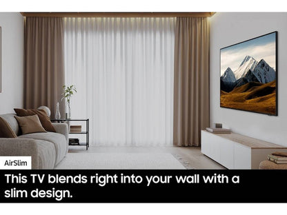 Samsung 65DU8000 Kenya wall-mounted in modern living room, AirSlim design flush against wall with mountain scene on screen