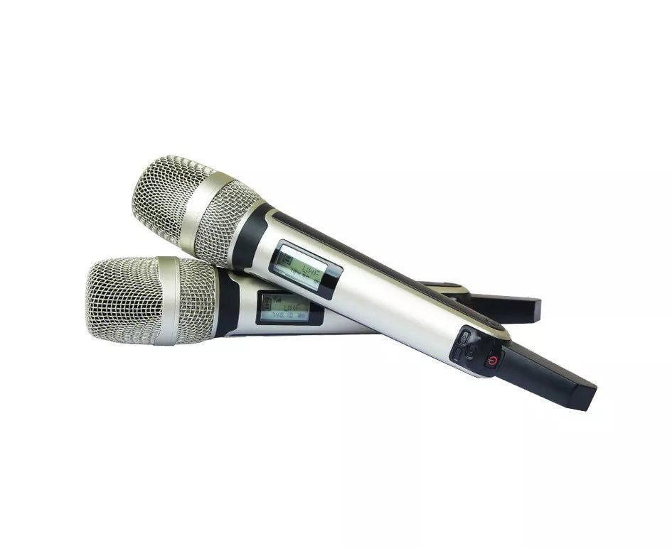 Sennheiser SKM 9000 wireless microphone Kenya — two handheld transmitters laid flat showing LCD display and capsule grille
