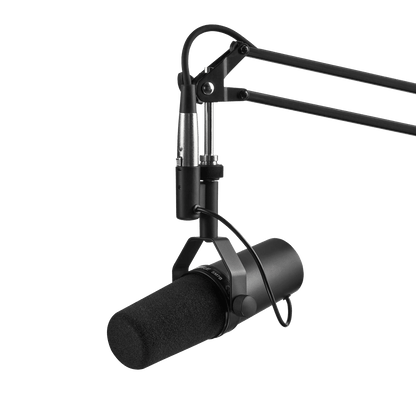 Shure SM7B Kenya mounted on scissor boom arm, full setup view showing yoke, SHURE SM7B body branding