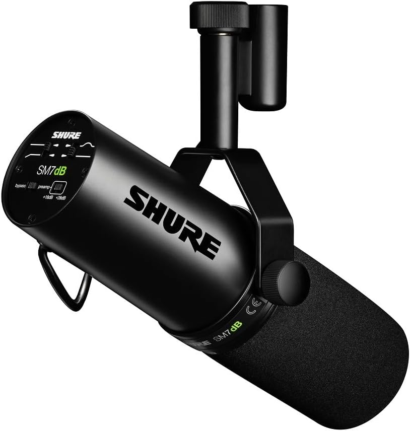 Shure M7dB Kenya on yoke mount, front-angled view showing SHURE branding, preamp controls, and mesh grille