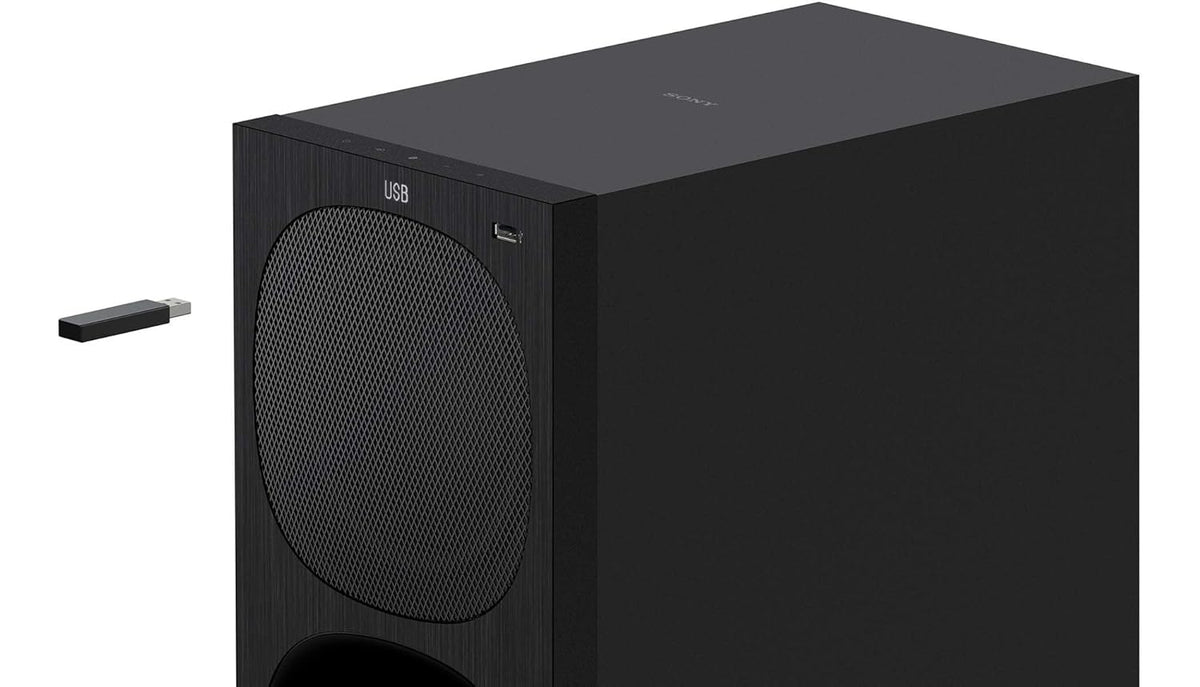 Sony HT-S20R Kenya subwoofer close-up showing USB port and woofer grille with USB drive beside it