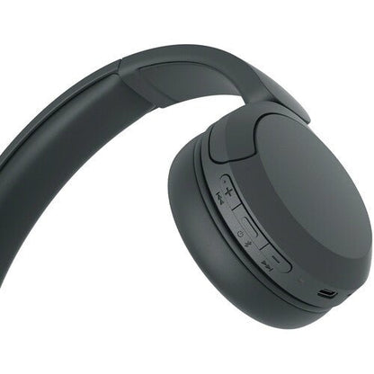 Sony WH-CH520 Kenya close-up of right earcup showing playback controls and USB-C charging port