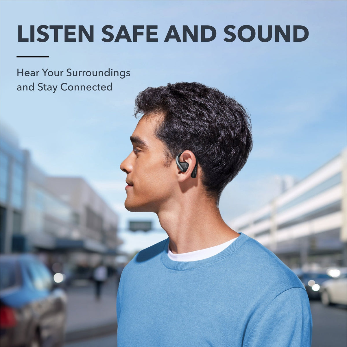 Soundcore AeroFit Kenya worn by man outdoors, open-ear fit shown from side, situational awareness lifestyle shot