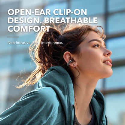 Soundcore C30i Kenya open-ear clip earbud worn on ear, lifestyle shot, breathable comfort outdoor setting