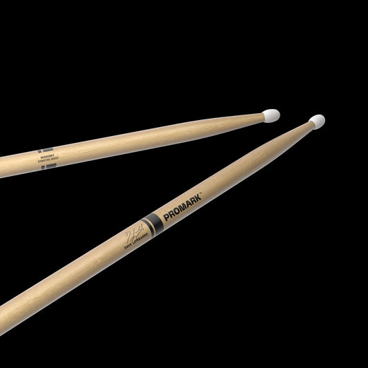 Close-up view of ProMark 2BX Drumstick showing its thick hickory wood shaft and smooth oval nylon tip.
