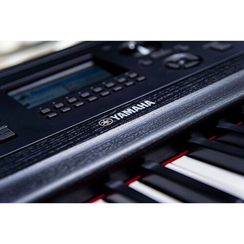 Yamaha DGX-670 keyboard close-up showing key action