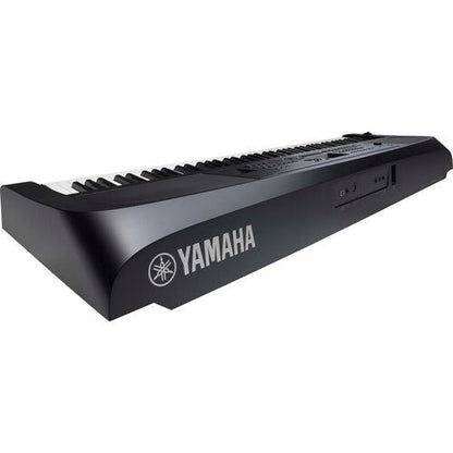 Yamaha DGX-670 portable grand piano front angle view