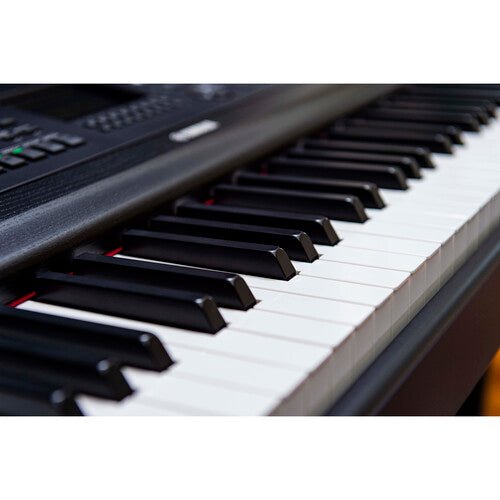 Yamaha DGX-670 keyboard close-up showing key action