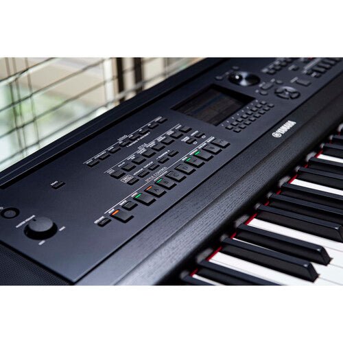Yamaha DGX-670 keyboard close-up showing key action