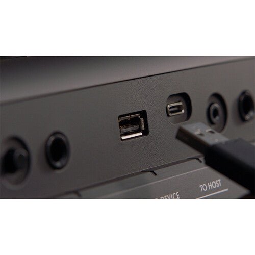 Yamaha PSR-E483 Kenya portable keyboard side profile view showing slim lightweight design
