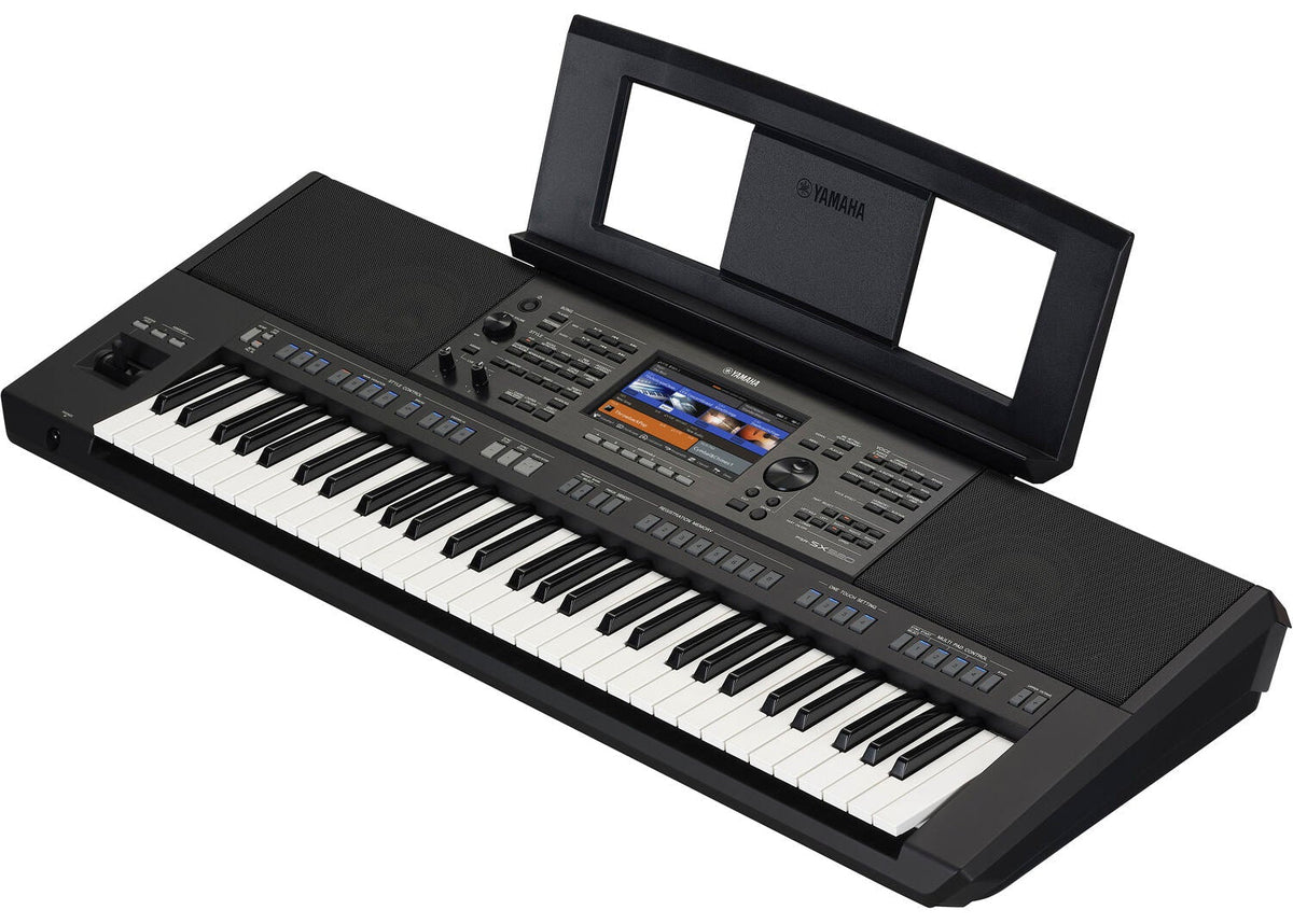 Yamaha PSR-SX920 Kenya angled keyboard view with music rest fitted above the touchscreen